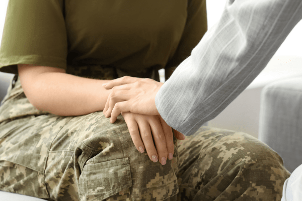 Untitled design - 2024-08-21T144539.470 a military induvial gets through PTSD treatment from a therapist.