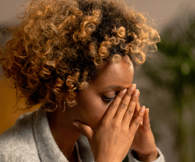 young lady overwhelmed with financial stress