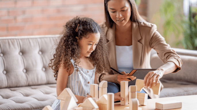 mom and daughter playing together