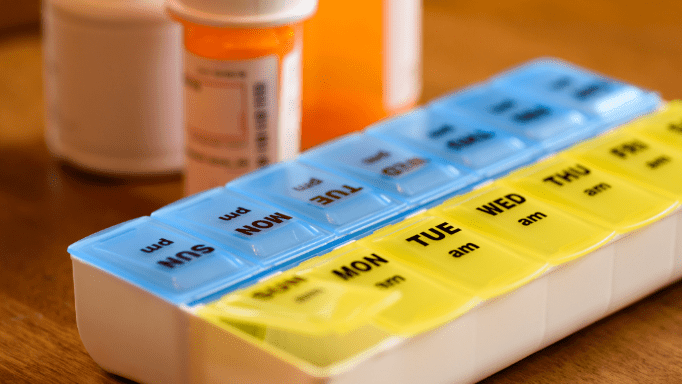 box of daily medications