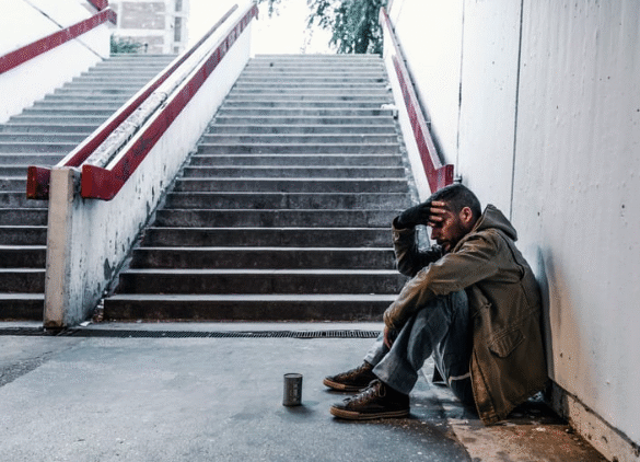 unhoused and stressed man