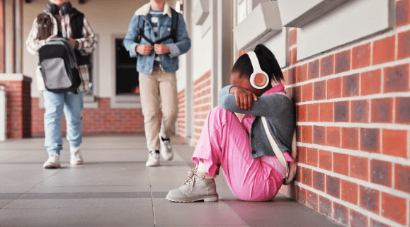 little girl crying at school